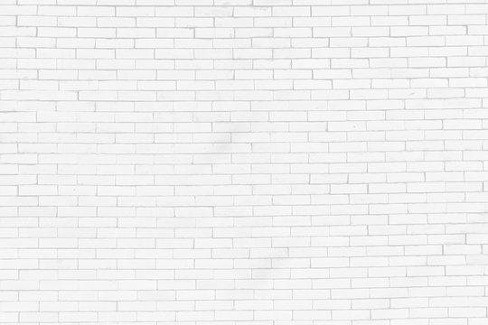 Modern white brick wall texture background for wallpaper and graphic web design. © Kudapy