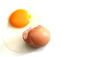 Broken egg on white background.