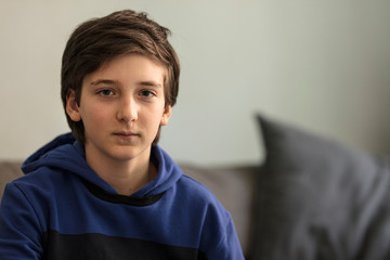 portrait of a young teenager solo in blue tones