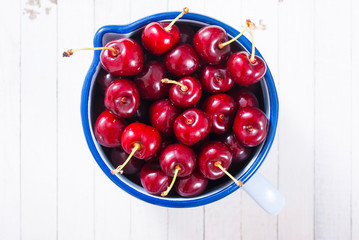 Cherry in enamel mug