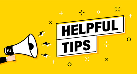 Male hand holding megaphone with Helpful Tips speech bubble. Loudspeaker. Banner for business, marketing and advertising. Vector illustration.
