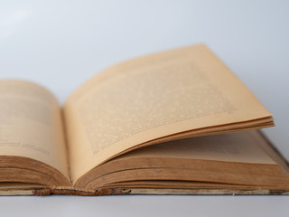 Old opened book with yellowed pages