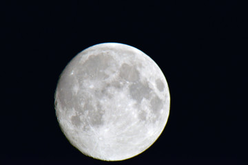 Shooting the moon on a summer evening in the Vosges region of France 