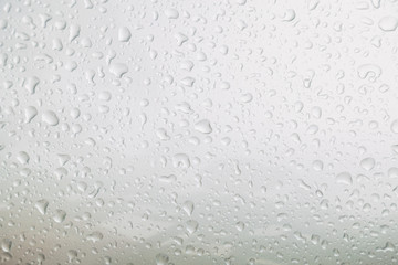 Top view rain drop on bronze car bonnet after rain fall for texture background.