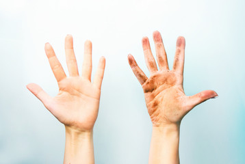 
Dirty and clean palm on a blue background