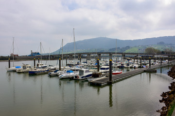 old jetty with small boats