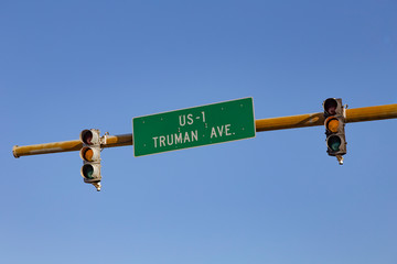 signage US Highway No 1 called Truman Ave starting in Key West with traffic lights