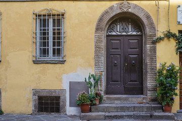 An old doorway in the city of Lucca, Tuscany, Italy.