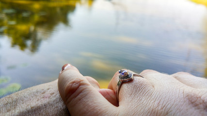 Caucasian couple celebrating engagement at waterside, Kruger National Park, South Africa