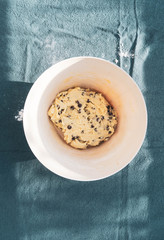 Homemade raw cookie dough on a bowl from above. Top view.