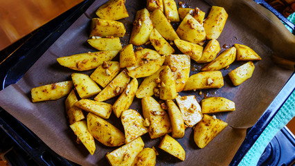 Raw potatoes chopped into small pieces.Chopped potato background, Space for text. Cooking concept.