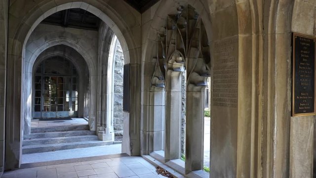 Arched cloisters and doorway to adjoining church.