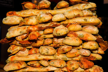 Bread Ahead pastry produce: bread sticks with tomato and olives