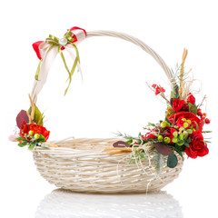 Fototapeta na wymiar Round white basket with red decor. Easter basket