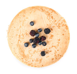 Tasty blini with berries on white background