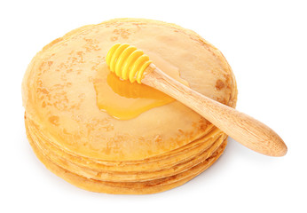 Tasty blini with honey on white background