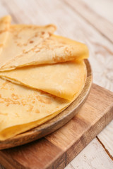Tasty blini on table, closeup