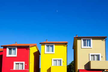 Fototapeta na wymiar Colorful houses and blue sky