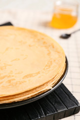Tasty blini on table, closeup