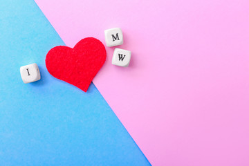Fototapeta premium Inscription I LOVE M and W on color background