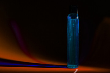 bottle with cream, shampoo for hair, shower gel, colored background, beautiful studio light, beauty and youth of the human body