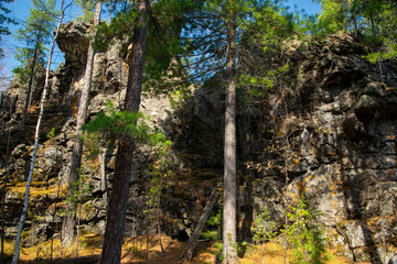 Fototapeta premium Ridge rock cliffs.Stone with lichen, close up, background.A rock formation on the climb of Stone Mountain.