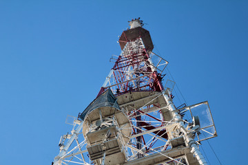Telecommunication tower on sky background bottom view
