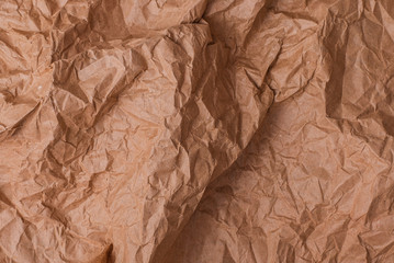 Rumpled brown cardboard paper texture