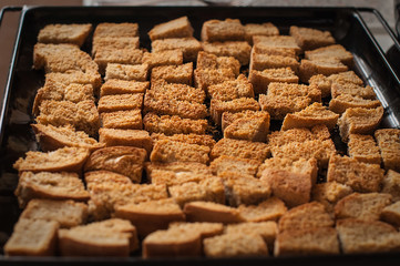 Home cooked rusks on a pan taken out of the oven