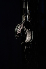 BDSM Leather handcuffs for role-playing games on a black background. Bondage for carnal pleasures....