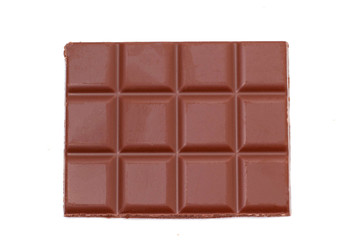 A bar of milk chocolate on a white background, isolate.