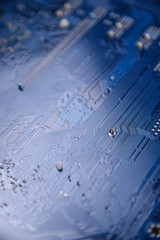 Computer motherboard background and electronical components cpu gpu memory and different sockets for video card close up