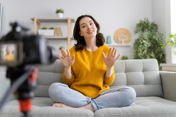 woman is recording vlog