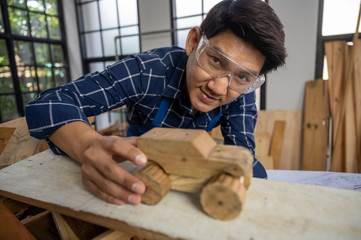 concept of wood DIY at home, carpenter working with wood