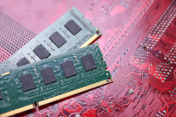 Computer memory RAM on motherboard background . Close up. system, main memory, random access memory, onboard, computer detail. Computer components . DDR3. DDR4. DDR5