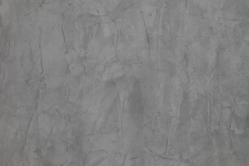 Dark grey cement wall with rustic natural texture for abstract background and design purpose
