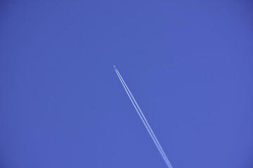 plane traces over the sky