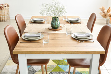 Served table in modern dining room