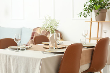 Served table in modern dining room