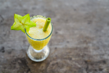Fruit cocktail in a glass on a wooden surface. Healthy diet. Healthy refreshing drink.