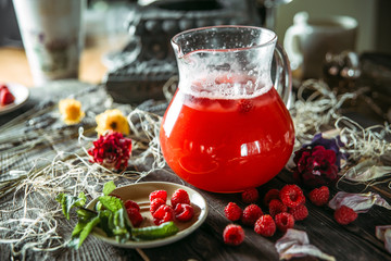 Sweet fresh berry lemonade beverage in a jar