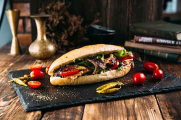 Juicy turkish doner in a loaf with marinated meat 