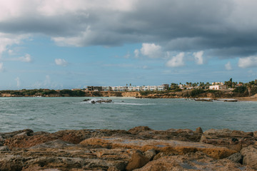 buildings near mediterranean sea against blue sky