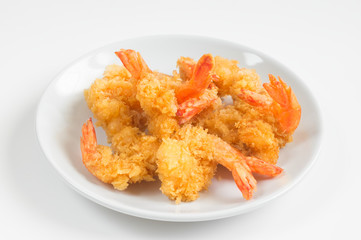 Fried shrimps on ceramic plate,white background.