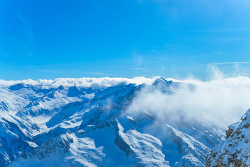 Fototapeta na wymiar ski Snowy and rocky peaks of the Austrian Alps