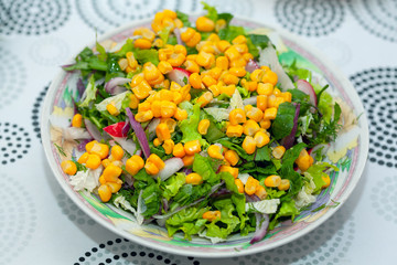 salad with corn kernels in the plate , ready for eat 