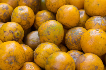 Bunch of fresh oranges fruit background.