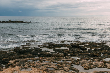 Fototapeta na wymiar mediterranean sea against cloudy and blue sky
