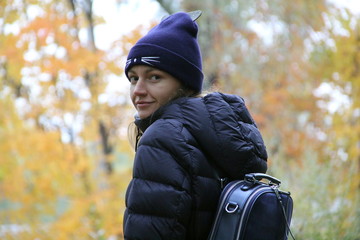 Girl in autumn in the Park