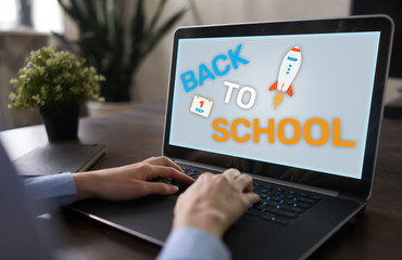 Back to school text on screen. Education and e-learning concept.